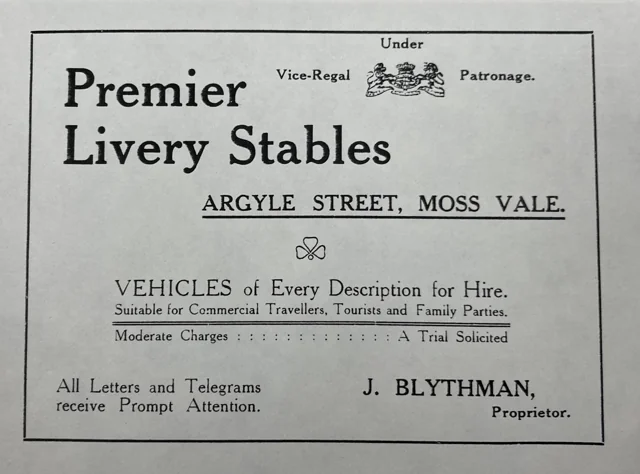 Advertisement for J. Blythman’s Premier Livery Stables in Argyle Street, offering vehicles for commercial travellers, tourists and family parties.